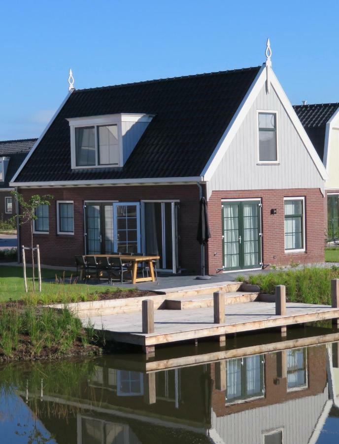 Luxurious Water Villa Uitdam Bagian luar foto